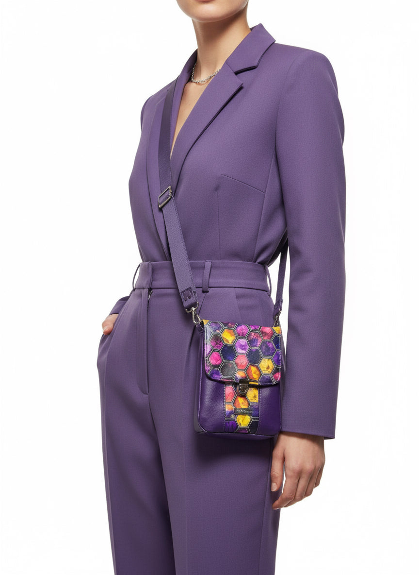 Crossbody bag with 3 card slots, and hidden back slip pocket.  Thumb lock closure with deluxe 1.5" adjustable purple strap